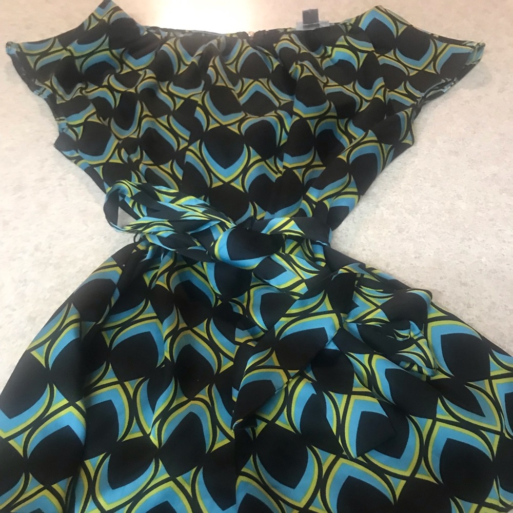 Worthington brand Woman’s L office or dinner blouse Peacock pattern.